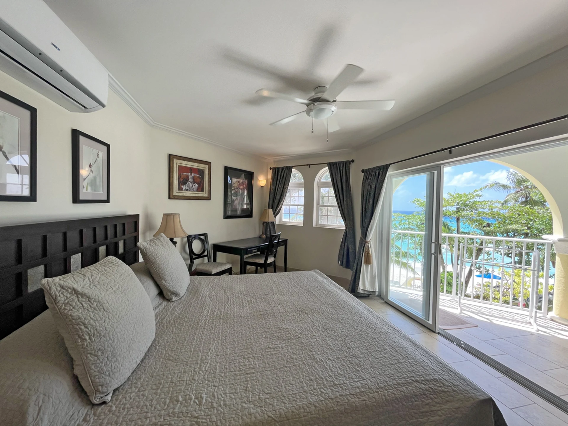 Primary bedroom with direct access to the patio