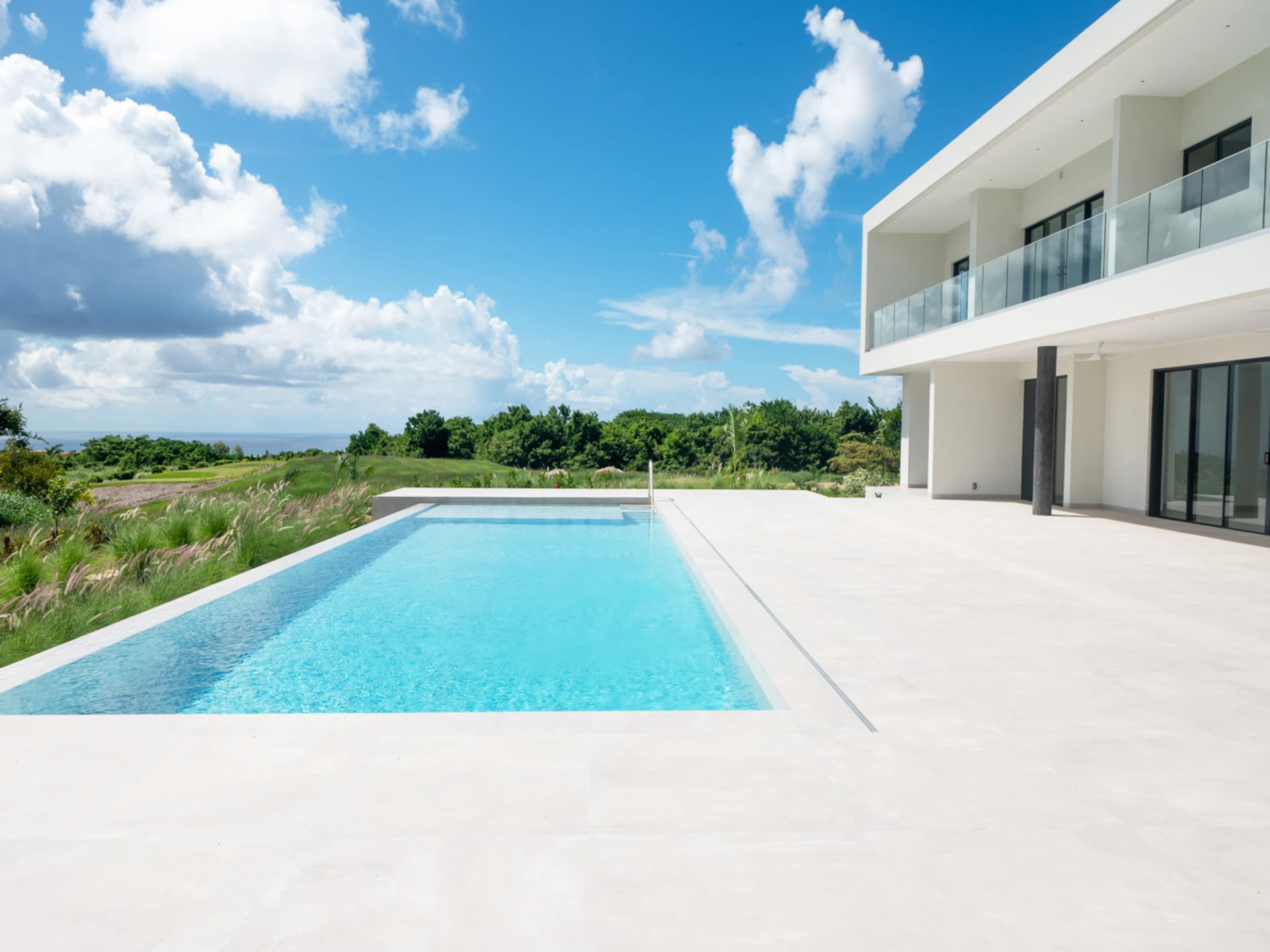 Spacious pool deck perfect for entertaining