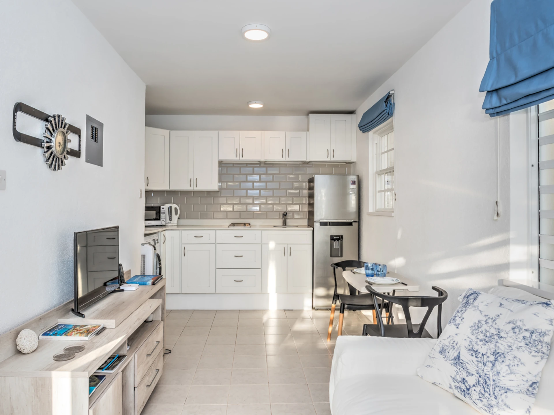 Living area and kitchen in the self-contained apartment