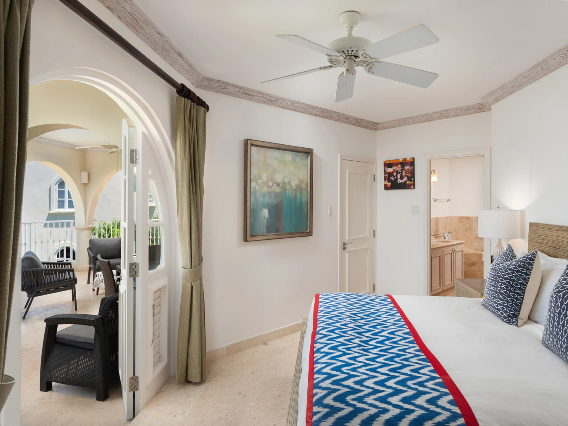 Primary bedroom leading to the main patio terrace