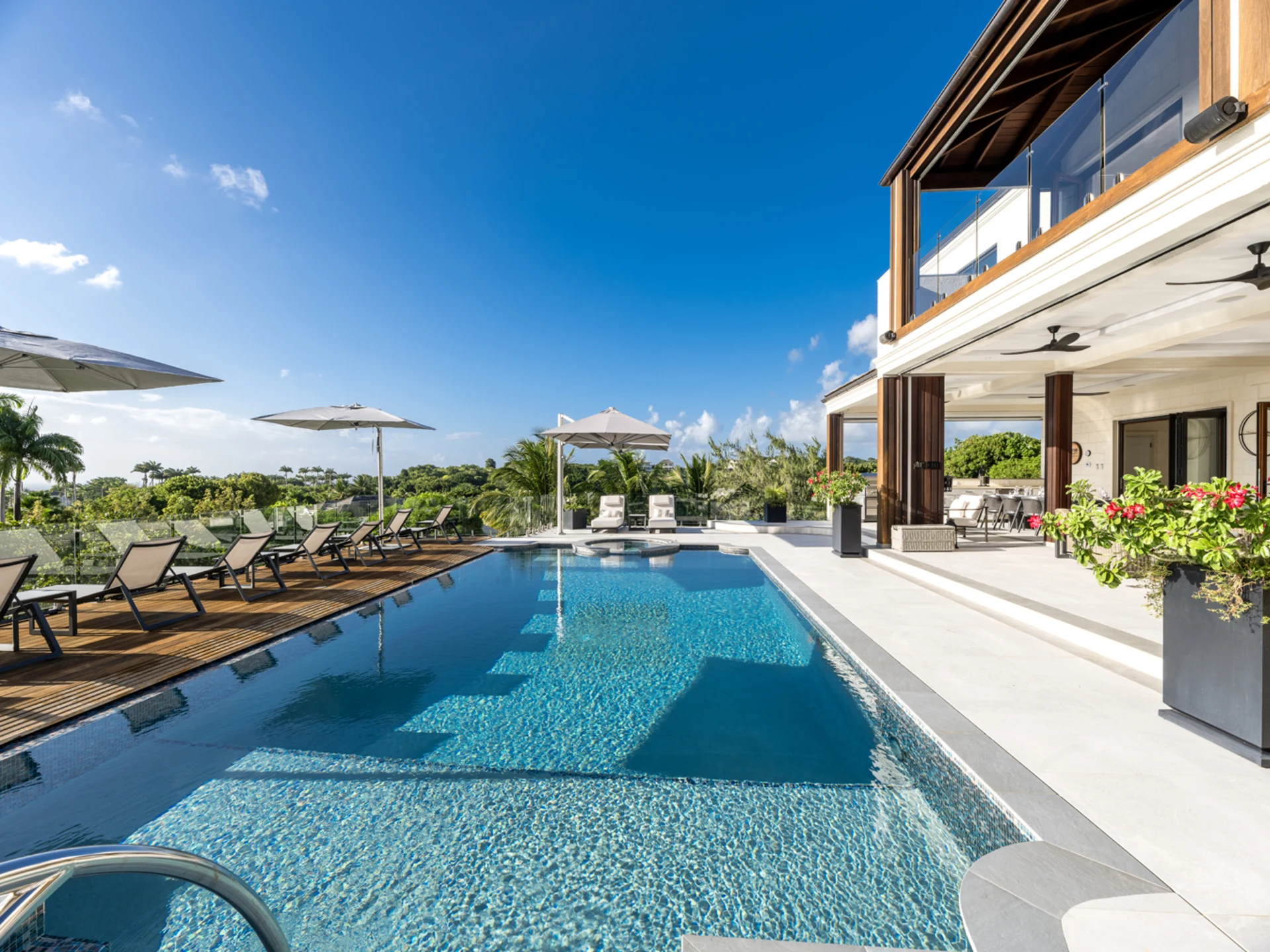 Spacious pool deck perfect for entertaining