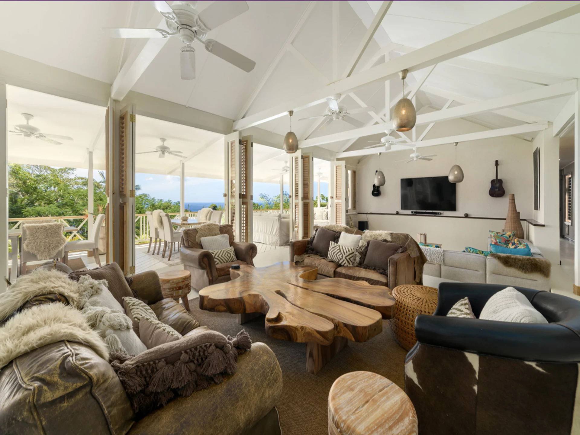 Bright and airy open plan living seamlessly leading to the patio areas