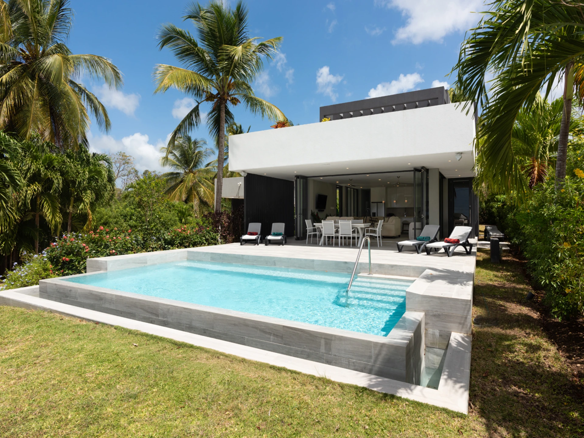 View of the inviting swimming pool from garden