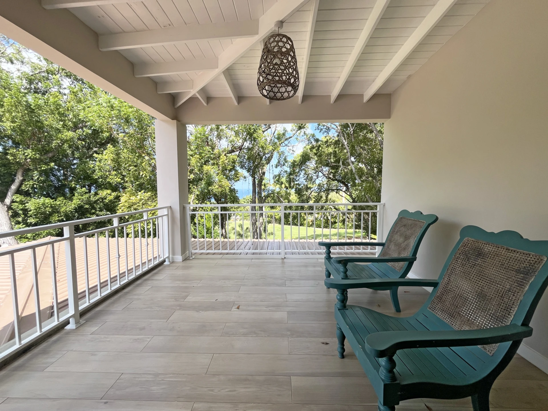 Private terrace with distant sea views off the main bedroom