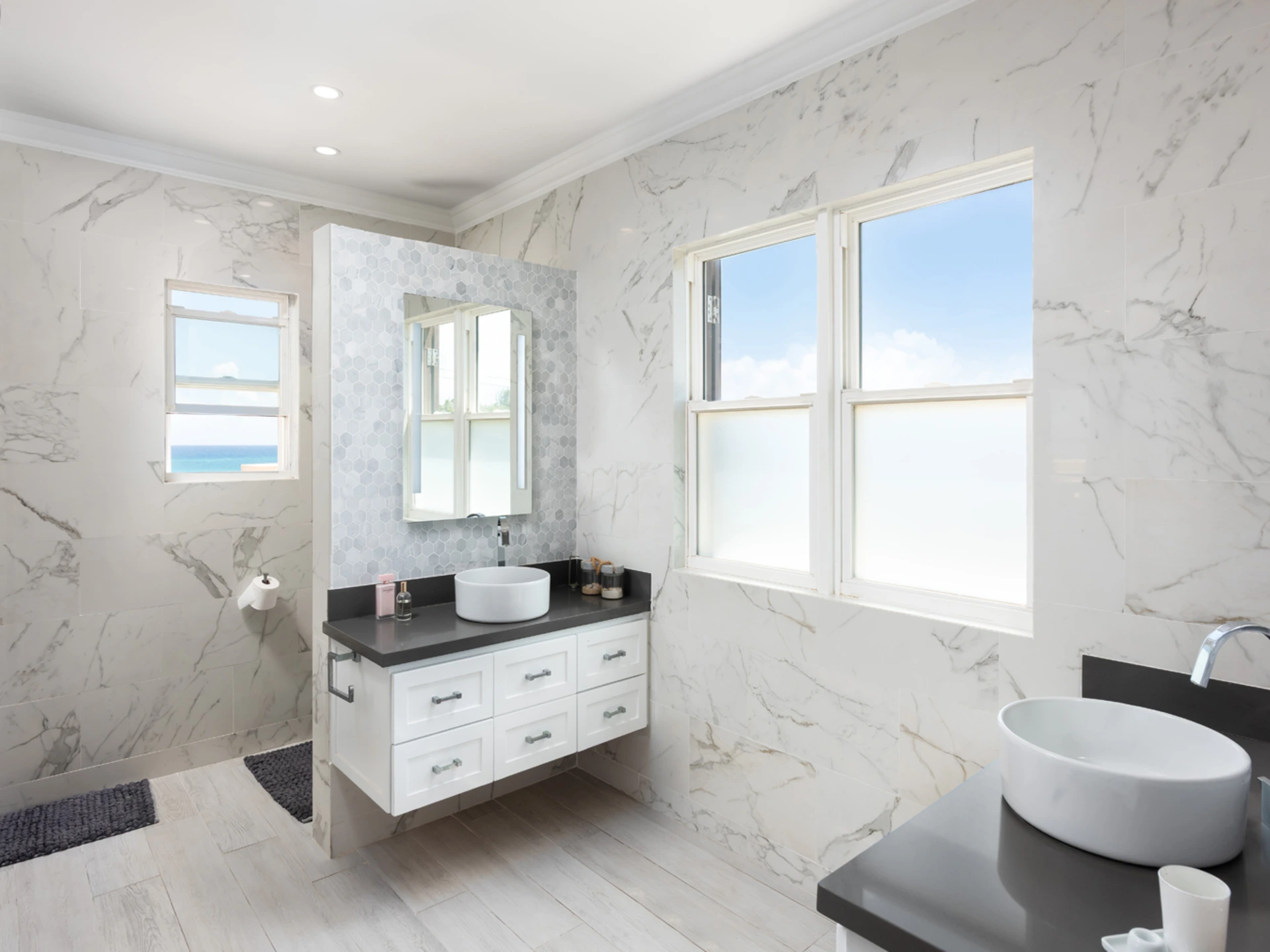 Main en-suite bathroom with double vanities