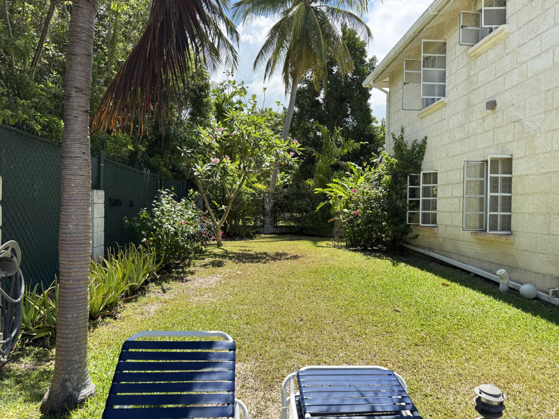 Lawn alongside Fairway Villas One