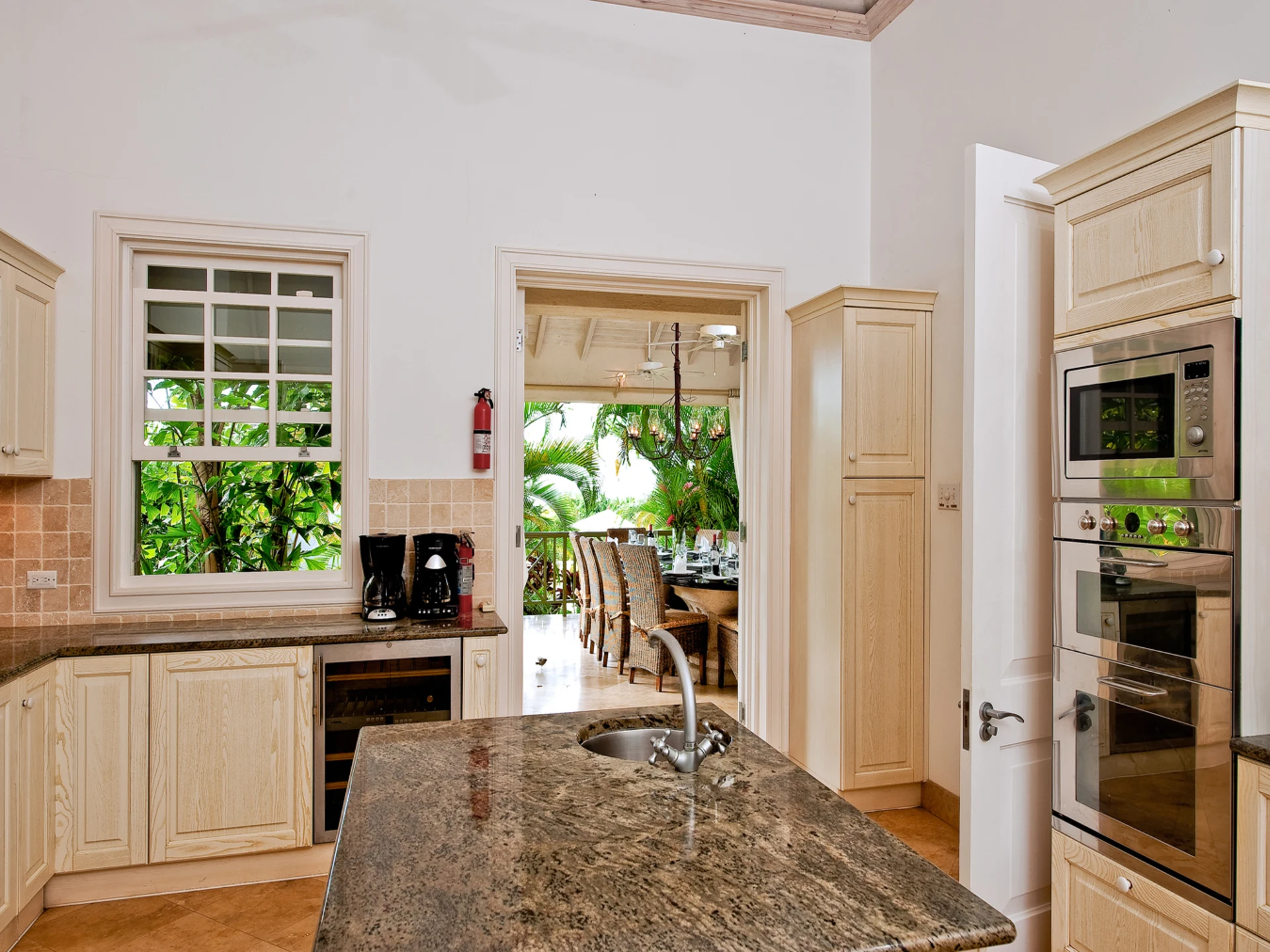 Fully fitted kitchen leading to the external dining area