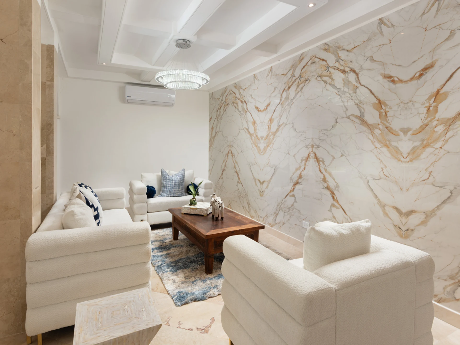 Living room with marble feature wall