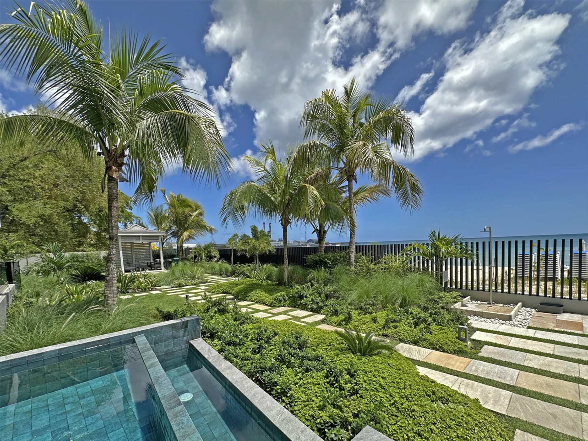 Communal pool and access to the beach at Allure
