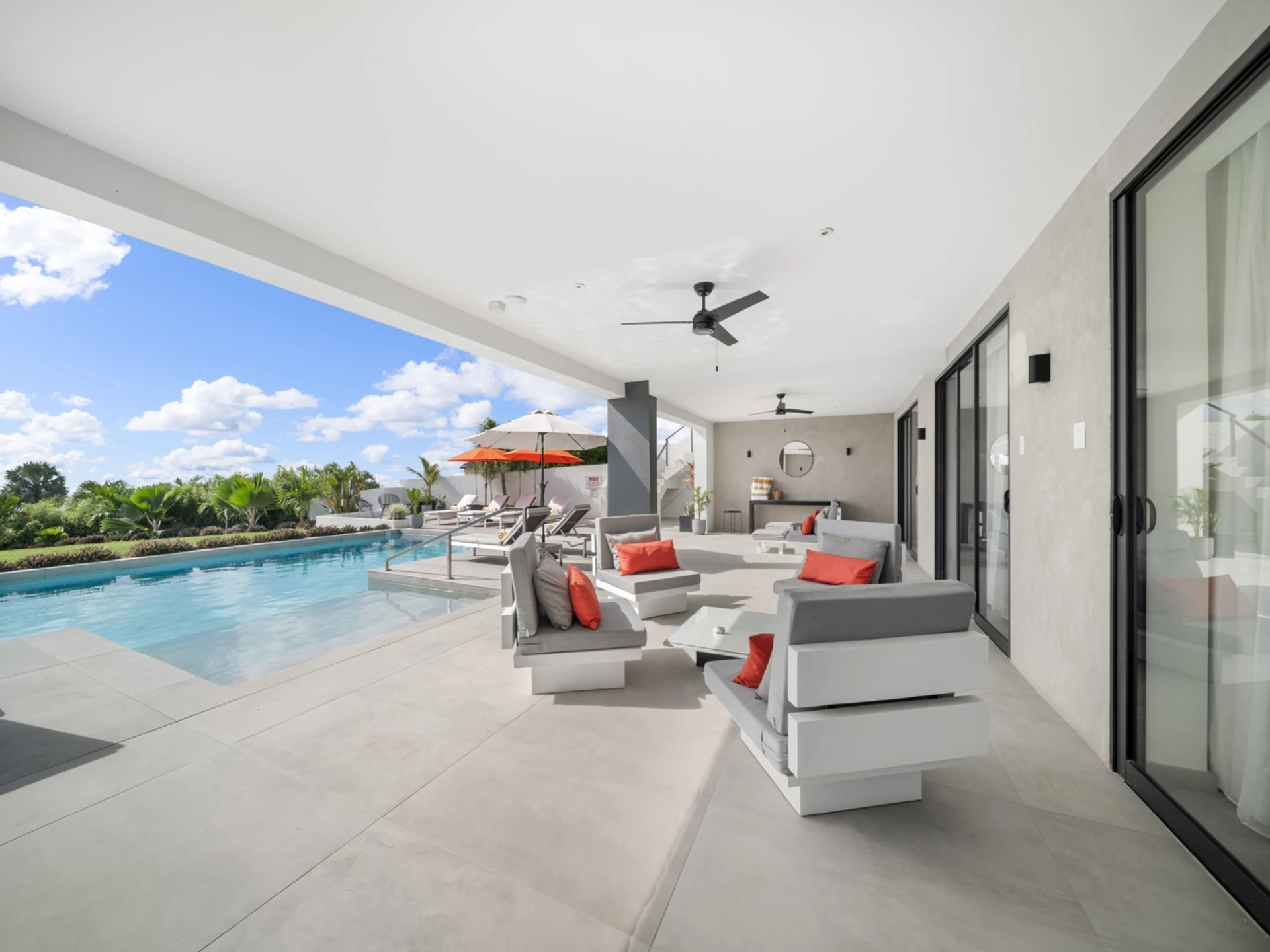 Expansive terrace overlooking the 46-ft saltwater pool