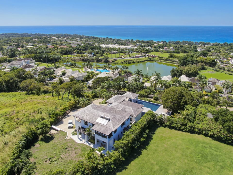 Aerial of house looking west towards the sea