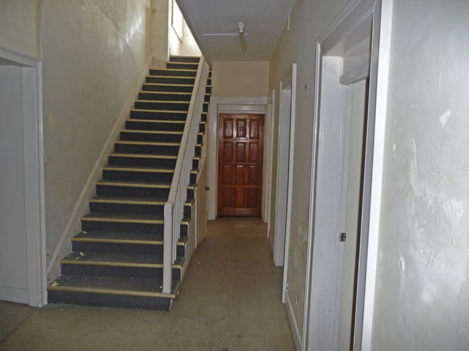 STAIRS LEADING UP TO 1ST FLOOR IN MAIN BUILDING