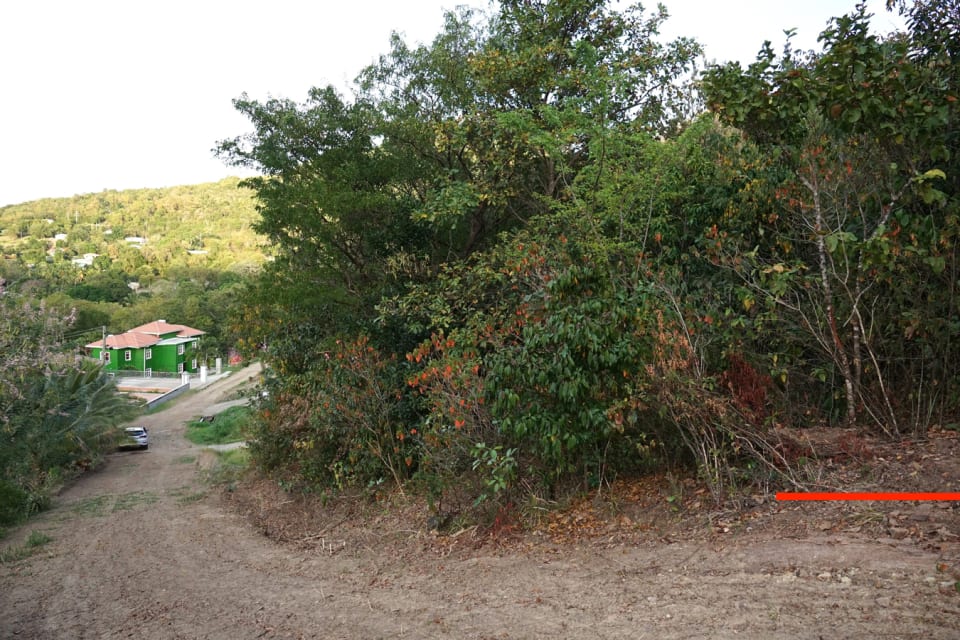 View from the top of the hill; lot is to the right marked by the red line