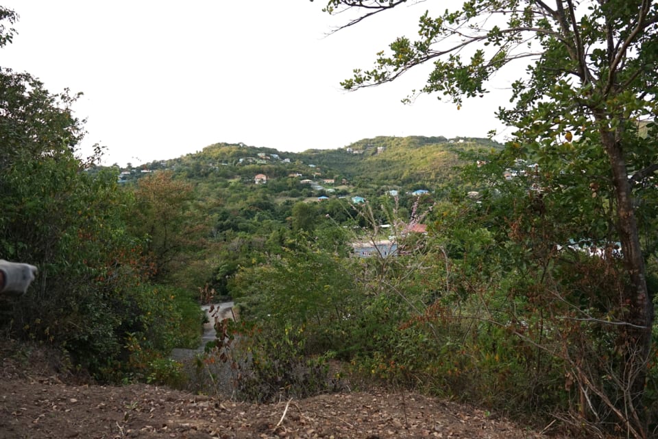 View from the right side of the lot of the mountains in Monchy