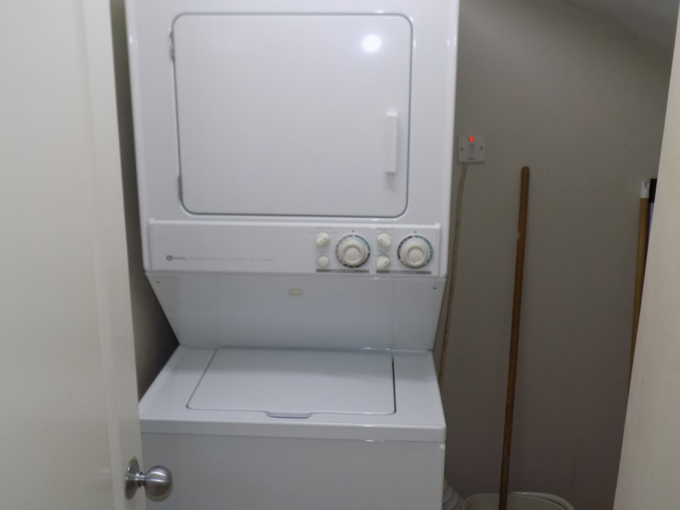 Washer and dryer combo in utility room