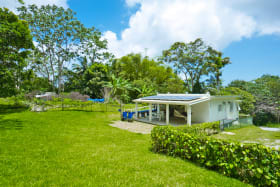 Home set within tropical garden