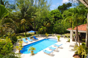 View of the swimming pool from the upstairs balcony