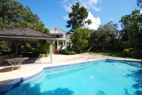 Swimming pool with pooside gazebo and deck