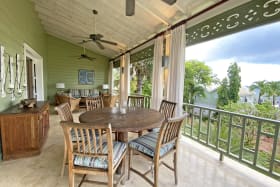 Breezy terrace with comfortable living and dining area