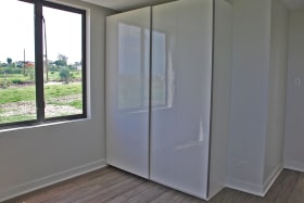 Bedroom with built-in closets