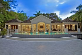 View of house and infinity pool from pool terrace