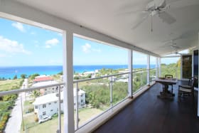 Large patio with views of the sea