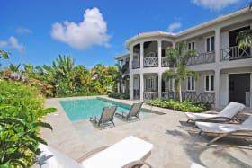 View of house from swimming pool terrace