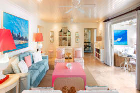 Sitting room opens to spacious verandah with dining
