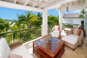 Lovely views of the pool garden and sea beyond from verandah upstairs