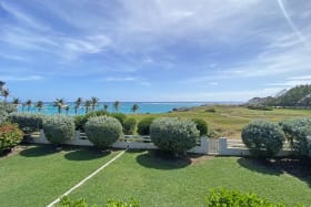 Uninterrupted ocean views from the patio overlooking the beautifully manicured gardens