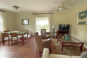 Living room and dining room with exit to front patio