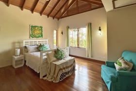 Main bedroom overlooking the pool deck