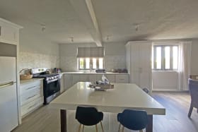 Kitchen with island on lower level