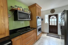 Kitchen Leads to Rear Patio