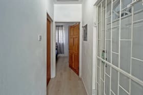 Hallway to bedroom and bathroom