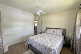 Both guest bedrooms feature built in closets