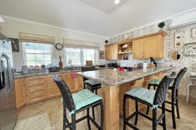 Spacious kitchen with breakfast bar