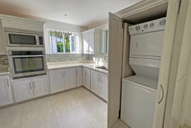 Laundry closet in kitchen