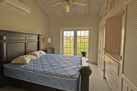 Primary bedroom with fitted wardrobes