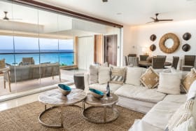 Spacious sitting and dining room opens to terrace