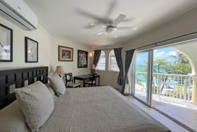 Primary bedroom with direct access to the patio