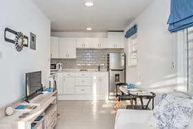 Living area and kitchen in the self-contained apartment