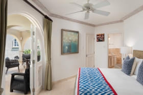 Primary bedroom leading to the main patio terrace