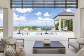 Living space opening out to the private pool and outdoor seating area