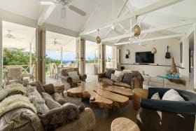 Bright and airy open plan living seamlessly leading to the patio areas