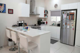 Well equipped kitchen and sit up dining
