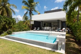 View of the inviting swimming pool from garden