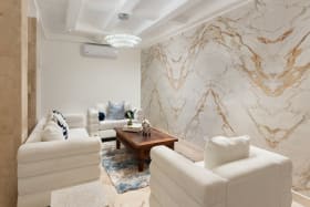 Living room with marble feature wall