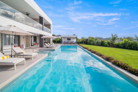 Expansive pool deck perfect for entertaining