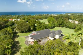 Aerial shot showing the existing house and lot